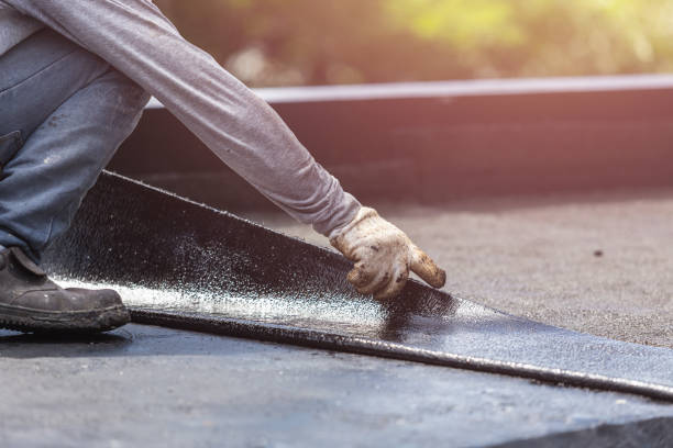 Professional Waterproofing technician working in Longport, NJ